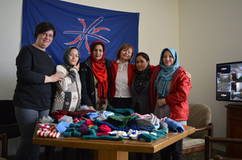 Migrant women hand-knitted gifts for the children using the services of the National Kitchen in Kikinda